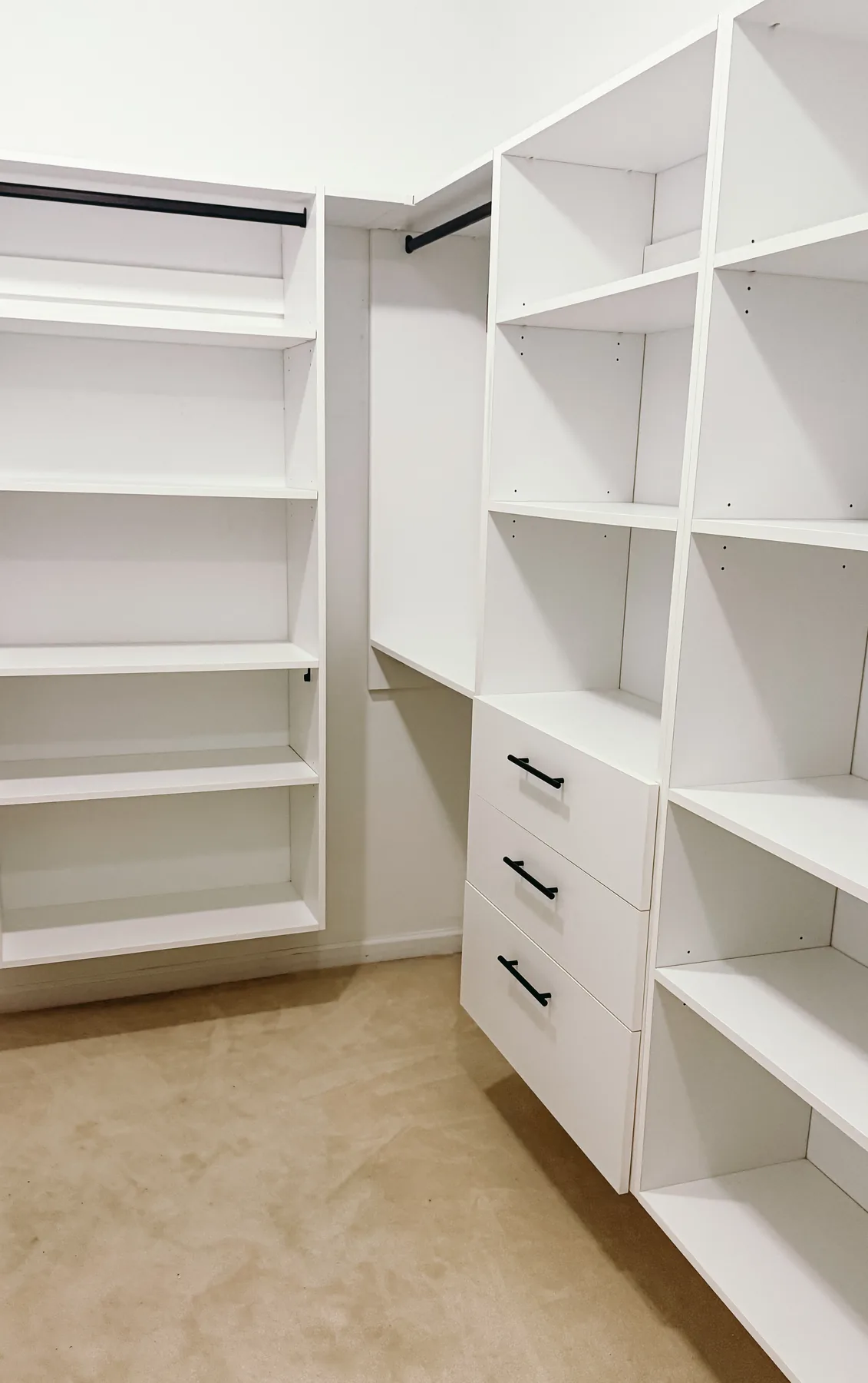 Open White Walk-In Closet with Dual Drawer Towers — finished view 2