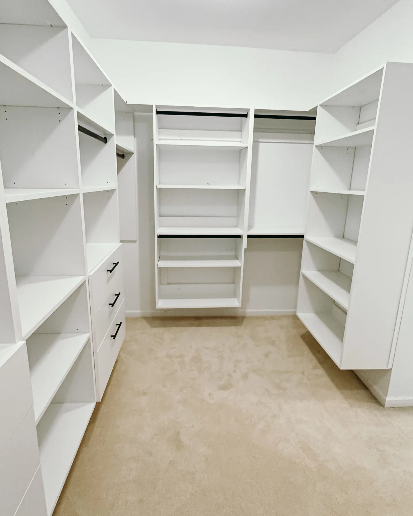 Open White Walk-In Closet with Dual Drawer Towers — finished view 3