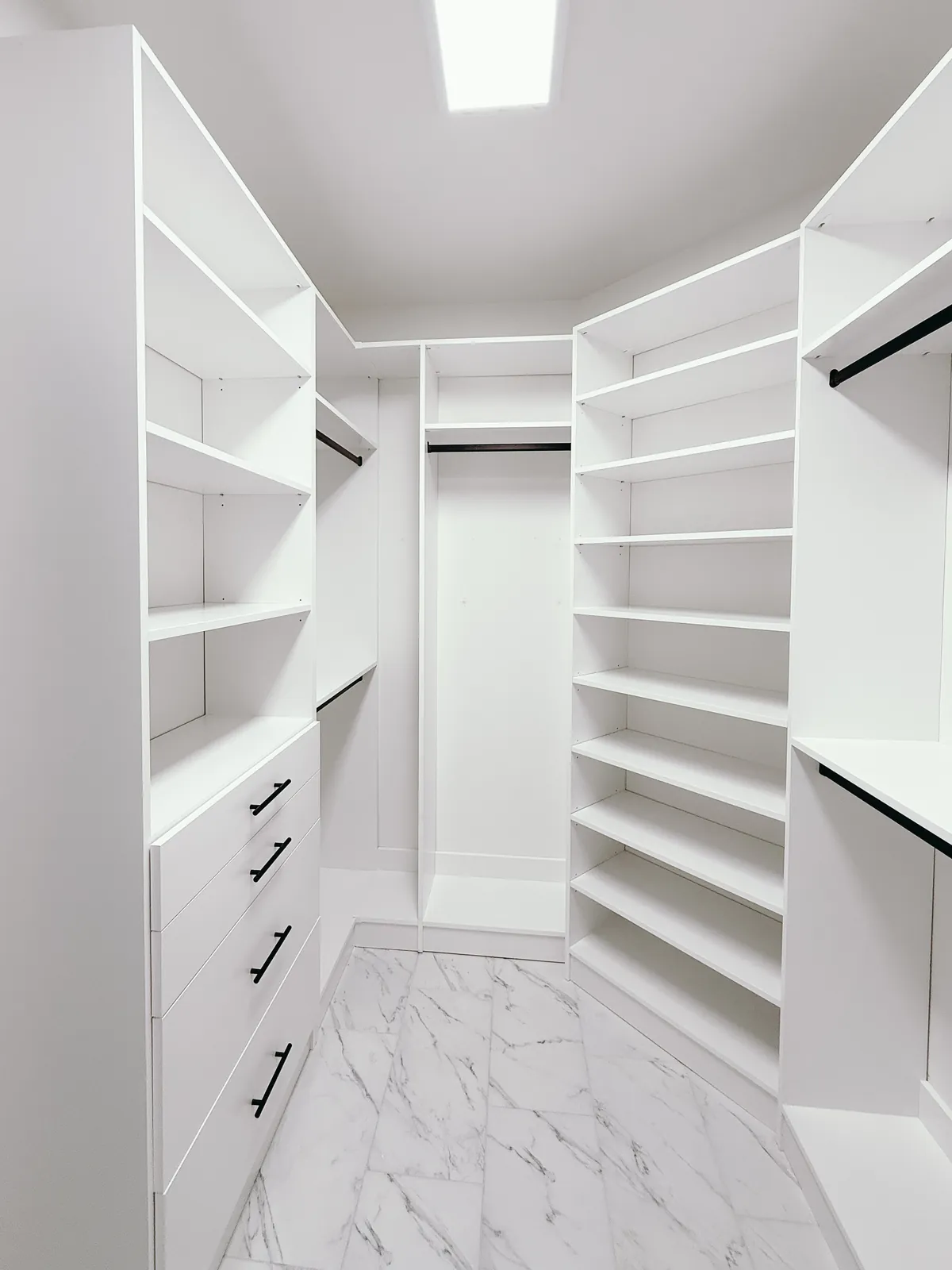 Walk-In Closet with Marble-Look Floor — finished view 2