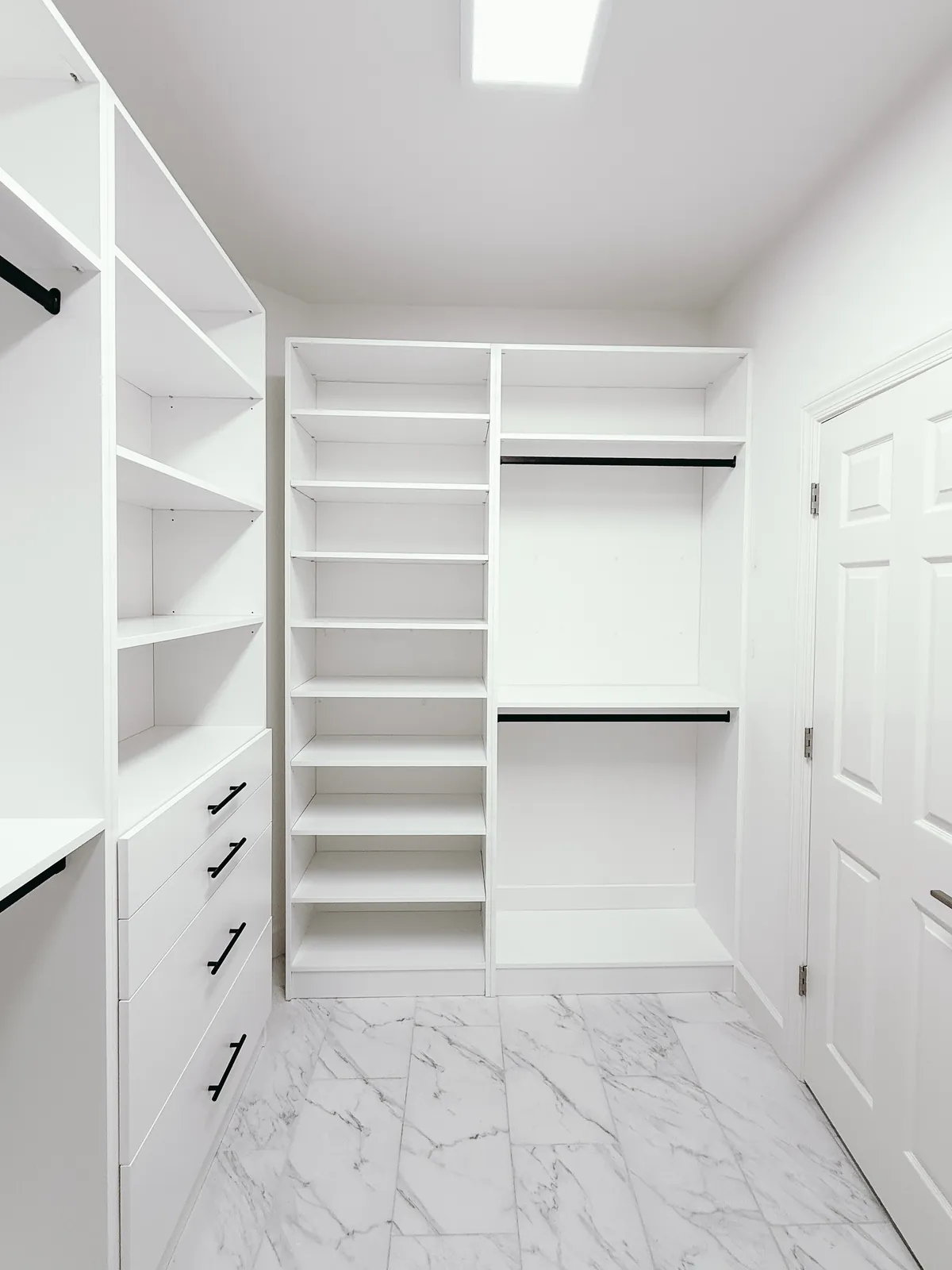 Walk-In Closet with Marble-Look Floor — finished view 4